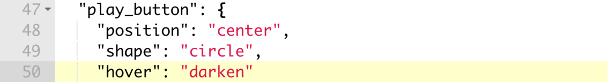 JSON code block showing how to make the play button darken on hover with a video.js player.